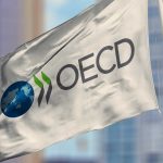August 23, 2019, Brazil. In this photo illustration the Organisation for Economic Co-operation and Development (OECD) soon appears on a flag.